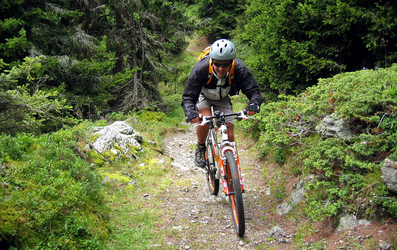 Man riding a mountain bike in the woods